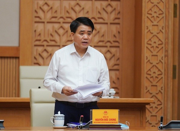 Chủ tịch UBND TP. Hà Nội Nguyễn Đức Chung báo cáo tại buổi làm việc.