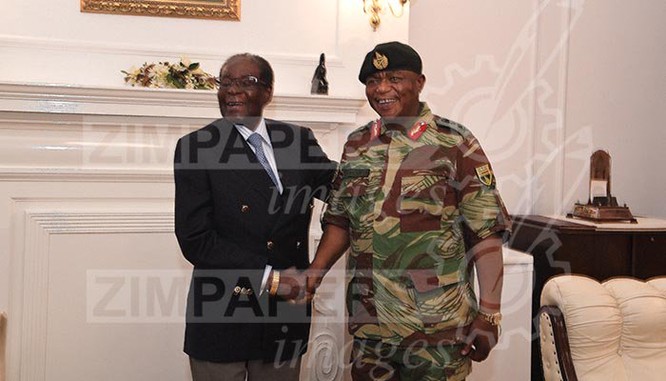 Tổng thống Zimbabwe Mugabe tươi cười xuất hiện trước báo chí ảnh 1