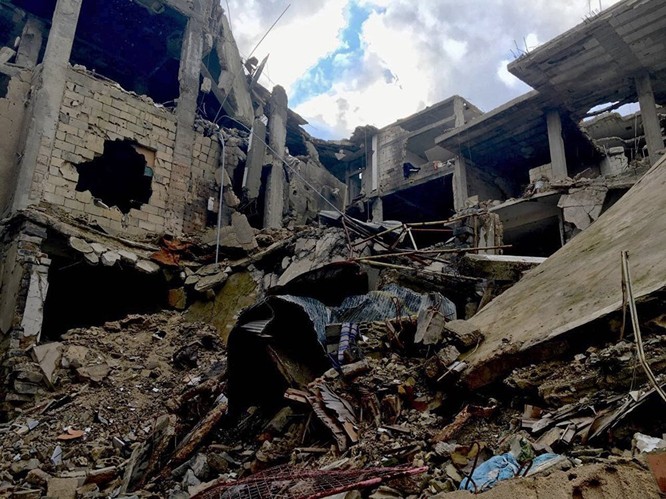 Những gì còn lại tại thành phố Homs của Syria ảnh 9