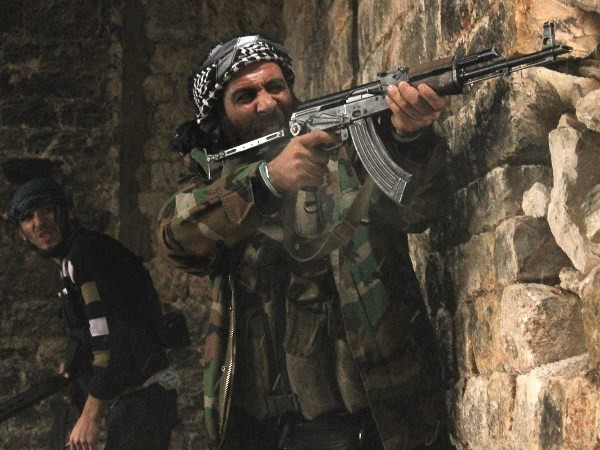 Tay súng phe đối lập Syria. (Ảnh: darkroom.baltimoresun.com)