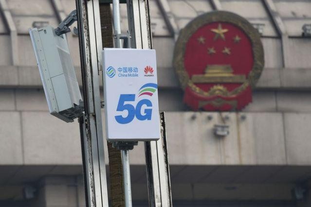 Bắc Kinh tuyên bố trả đũa việc Mỹ hủy niêm yết các công ty viễn thông Trung Quốc ảnh 1
