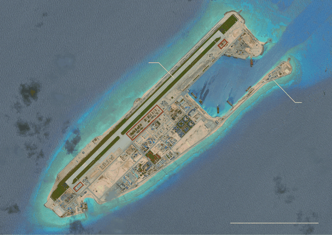 Đá Chữ Thập sau khi được cải tạo thành đảo nhân tạo có diện tích lớn nhất Trường Sa với một đường băng dài 3km và các nhà chứa máy bay