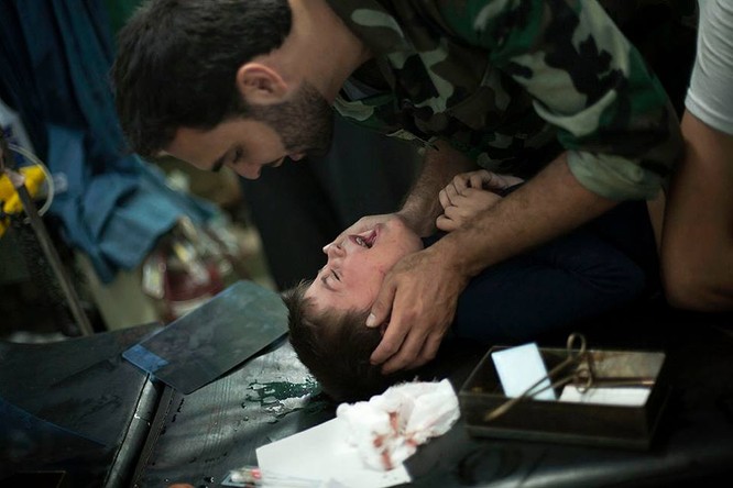 Chùm ảnh thảm họa nhân đạo trẻ em ở địa ngục Syria ảnh 41