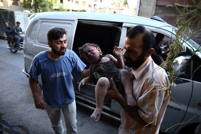 Chùm ảnh thảm họa nhân đạo trẻ em ở địa ngục Syria ảnh 45