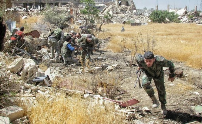 Quân đội Syria tấn công dữ dội phe thánh chiến cố thủ đông Damascus ảnh 16