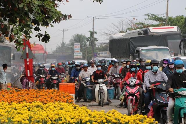 Tỉnh, thành nào siết chặt quy định cách ly, xét nghiệm Covid-19 với người về quê đón Tết? ảnh 1