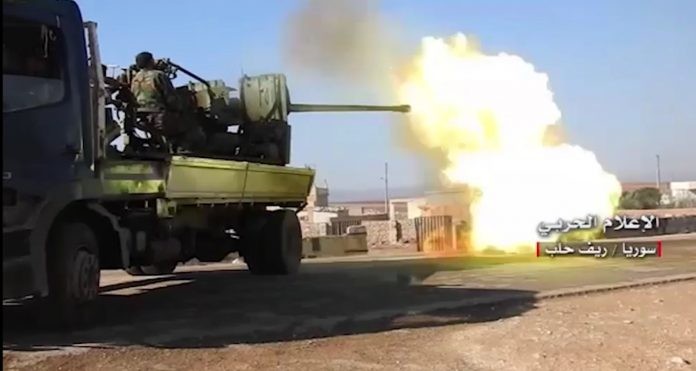 Pháo phòng không quân đội Syria xối đạn vào phiến quân ở Aleppo - video truyền thông Hezbollah