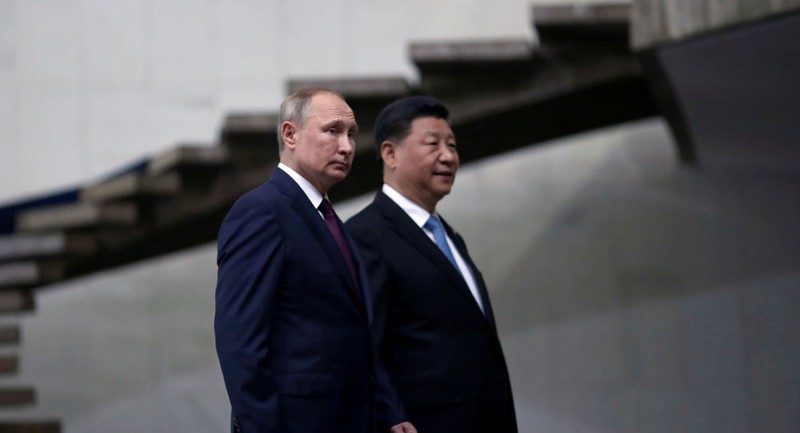 Tổng thống Nga Vladimir Putin và Chủ tịch Trung Quốc Tập Cận Bình trong một cuộc gặp gỡ (Ảnh: Sputnik)