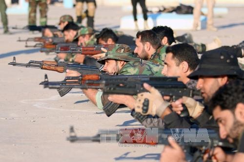 Binh sĩ Iraq tham gia cuộc diễn tập quân sự ở al-Zubair, gần thành phố Basra ngày 13/2. Ảnh: AFP/TTXVN