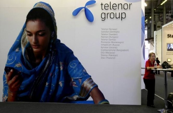 Quảng cáo của Telenor, một trong những nhà cung cấp dịch vụ viễn thông đang hoạt động tại thị trường bùng nổ Myanmar - Ảnh: Reuters