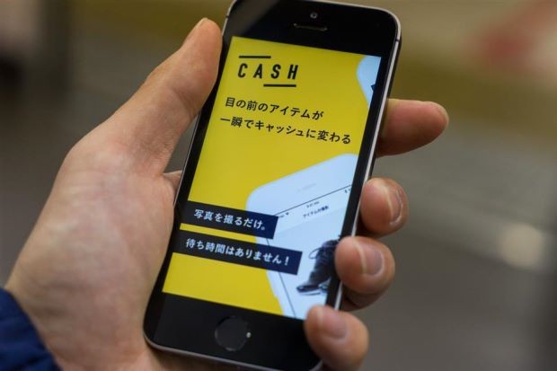 Giao diện ứng dụng Cash trên smartphone tại Tokyo. Ảnh Bloomberg.