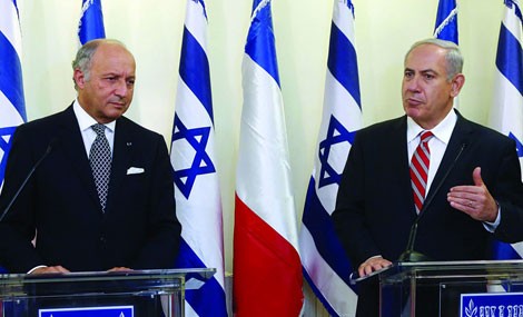 Ngoại trưởng Pháp Laurent Fabius và Thủ tướng Israel Benjamin Netanyahu trong chuyến thăm ngày 21/6.