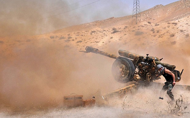 Quân đội Syria mở rộng tấn công ngoại vi thành cổ Palmyra