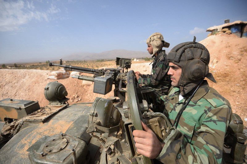 Binh sĩ lực lượng sư đoàn cơ giới số 4 trên chiến trường Bắc Hama, ảnh Masdar News