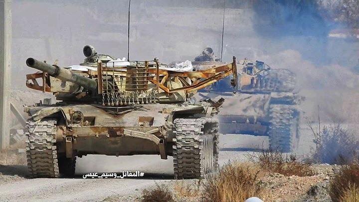 Tăng, thiết giáp quân đội Syria trên chiến trường Đông Ghouta - ảnh minh họa Masdar News