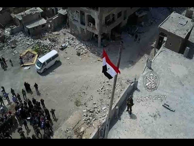 Quân đội Syria thượng cờ trên nóng ngôi nhà cao tầng ở quận Jobar - video truyền thông quân đội Syria