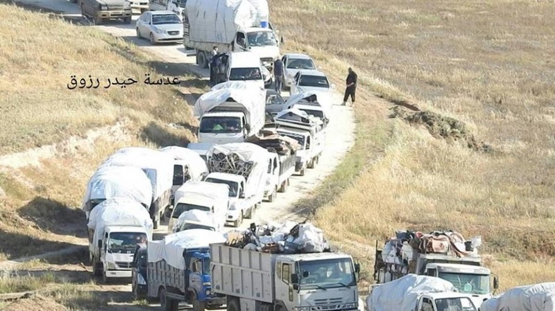 Đoàn xe di tản từ khu vực Rastan tỉnh Homs về phía bắc Syria. Ảnh minh họa của Masdar News