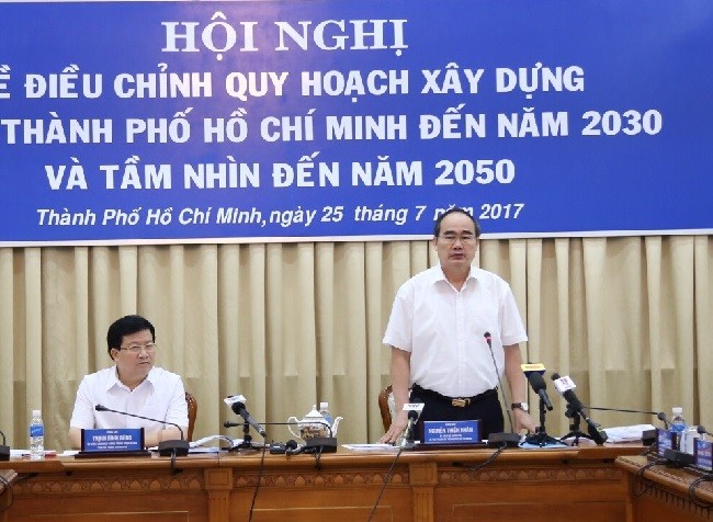 Phó Thủ tướng Trịnh Đình Dũng cùng Bí thư Thành ủy TPHCM Nguyễn Thiện Nhân