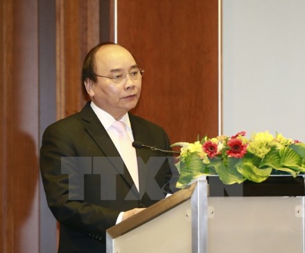 Thủ tướng Nguyễn Xuân Phúc dự Diễn đàn Doanh nghiệp Việt Nam-Đức. Ảnh: TTXVN