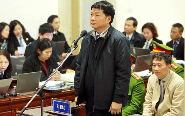 Ông Đinh La Thăng, ông Trịnh Xuân Thanh tại phiên tòa sơ thẩm. Ảnh: TTXVN