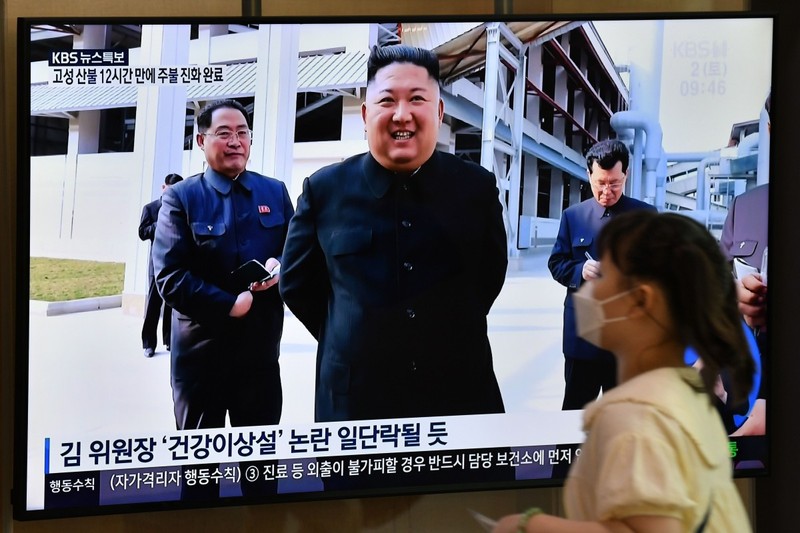 Tin tức về sự trở lại của lãnh đạo Triều Tiên Kim Jong-un xuất hiện trên truyền hình Hàn Quốc (Ảnh: AFP)