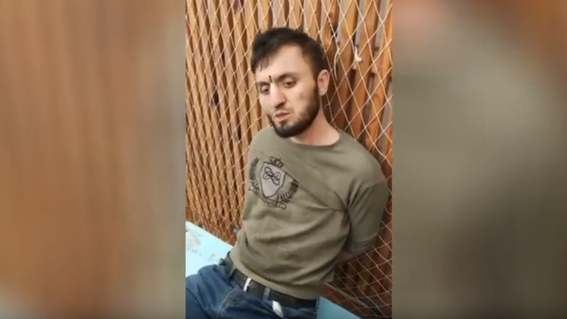 Một trong số những nghi phạm trong vụ tấn công khủng bố đẫm máu ở Nga (Ảnh: RT)