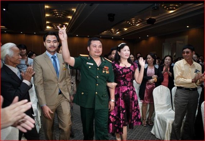 Bị can Lê Xuân Giang (mặc quân phục) tại một cuộc hội thảo của Liên kết Việt.Ảnh: lkv.com.vn