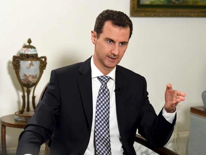 Tổng thống Syria, Bashar al-Assad thông báo cuộc bầu cử quốc hội diễn ra ngày 13.4 với nhiều đảng tham gia - Ảnh: Reuters