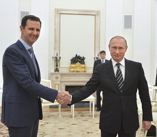 Giới quan sát cho rằng ông Putin rút quân khỏi Syria để ép ông Assad chấp nhận giải pháp hòa bình Ảnh: Reuters