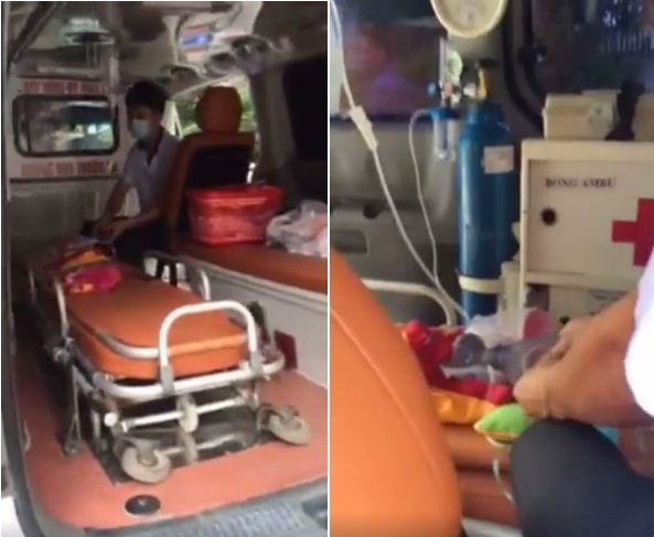 Hình ảnh cháu bé nằm trong xe cứu thương bị chặn tại BV Nhi TW (Ảnh cắt từ clip)