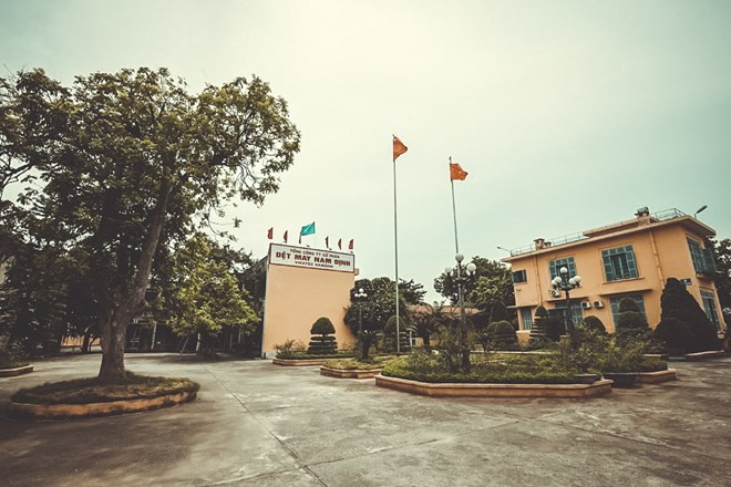 Nhà máy Dệt Nam Định tiền thân là một cơ sở nghiên cứu về tơ lụa do Toàn quyền Đông Dương - De Lanessan sáng lập. (Ảnh: Minh Sơn/Vietnam+)