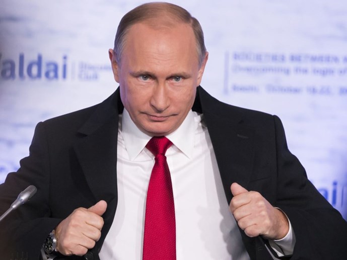 Tổng thống Nga Vladimir Putin tự ví mình là một chú chim bồ câu nhưng có đôi cánh thép - Ảnh: AFP