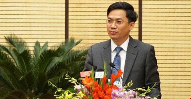 Ông Hà Minh Hải, Cục trưởng Cục Thuế Hà Nội trả lời chất vấn về nợ thuế. Ảnh: Minh Huệ