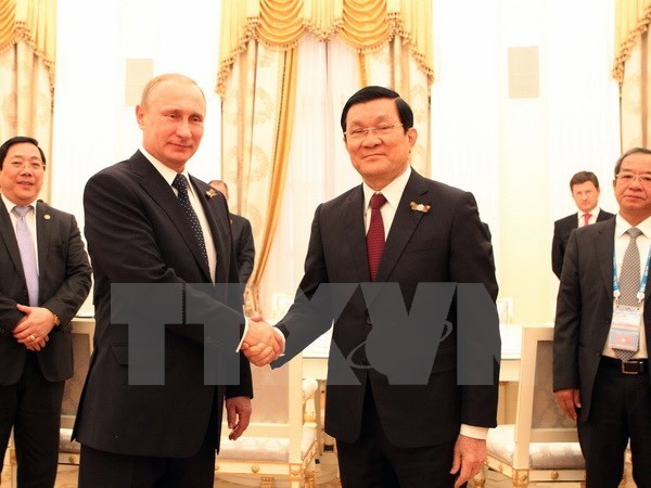 Tổng thống Liên bang Nga Vladimir Putin và Chủ tịch nước Trương Tấn Sang. (Ảnh: Nguyễn Khang/TTXVN)