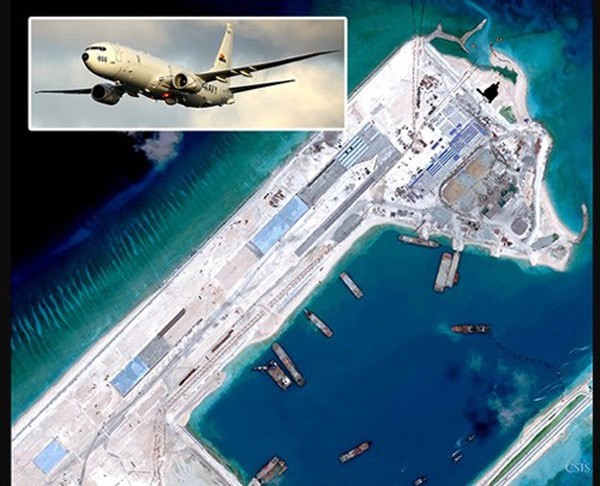 Máy bay P-8A Poseidon của Hải quân Mỹ đã làm ngơ trước các lần cảnh báo xua đuổi của hải quân Trung Quốc ngày 20.5 khi bay tuần gần các đảo nhân tạo Trung Quốc đang xây phi pháp ở quần đảo Trường Sa của Việt Nam - Ảnh: CSIS/Reuters