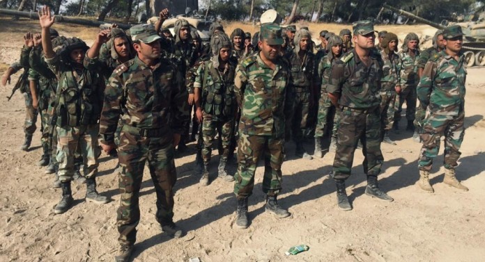 Binh sĩ Quân đội Syria chuẩn bị tấn công trên vùng nông thôn tỉnh Homs