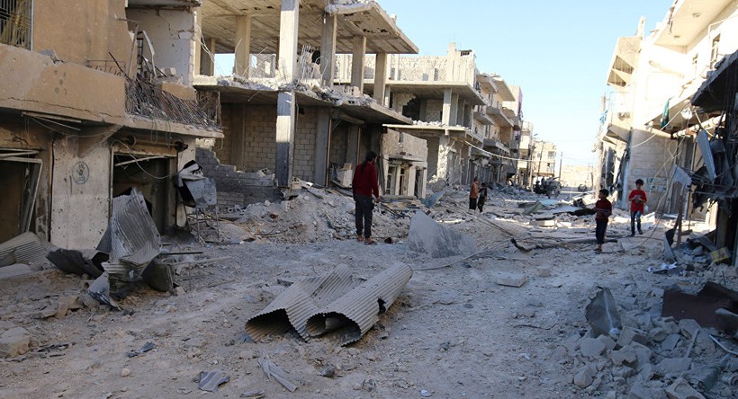 Một khu phố ở Aleppo, tan hoang sau những trận pháo kích bằng "pháo địa ngục" của lực lượng Hồi giáo cực đoan