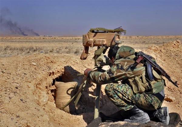 Một lính trinh sát Syria trên chiến trường Hama