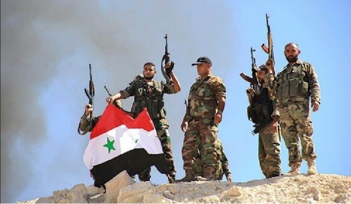 Binh sĩ quân đội Syria trên cao điểm Al-Humer phía đông thị trấn Hadar - ảnh minh họa Masdar News