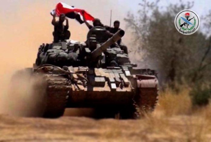 Xe tăng quân đội Syria trên chiến trường Idlib - ảnh minh họa Masdar News
