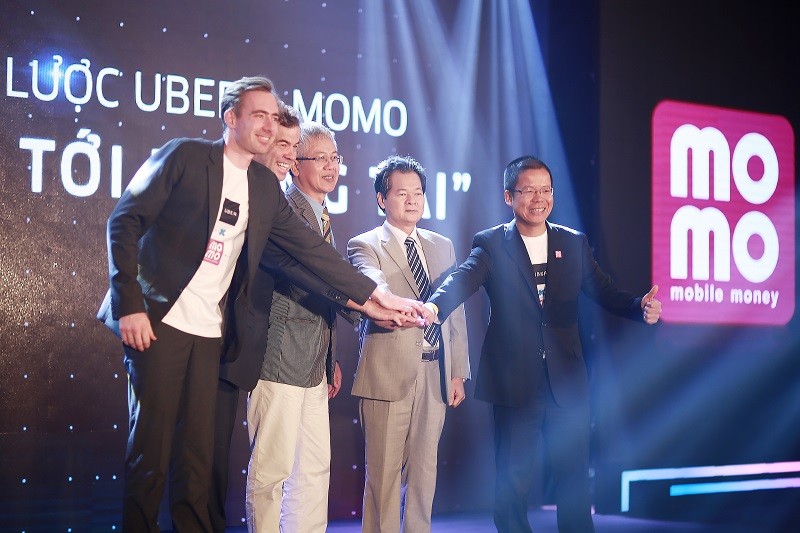Từ nay, người dùng có thể đặt xe Uber, thanh toán ngay trên ứng dụng ví điện tử MoMo, Ví điện tử MoMo sẽ trở thành một trong ba phương thức thanh toán chính của dịch vụ Uber tại Việt Nam