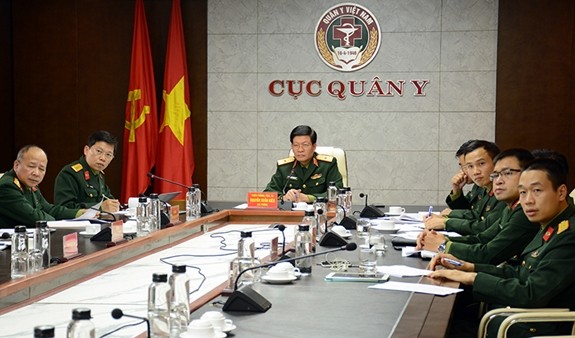 Thiếu tướng, PGS.TS Nguyễn Xuân Kiên cùng các thành viên Đoàn Việt Nam tại điểm cầu Hà Nội. Ảnh: Báo QĐND