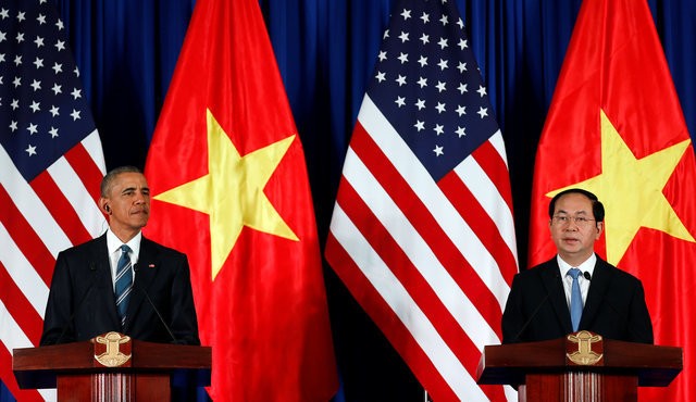 Chủ tịch nước Trần Đại Quang và Tổng thống Obama tại họp báo quốc tế Việt Nam - Hoa Kỳ - Ảnh: Reuters.