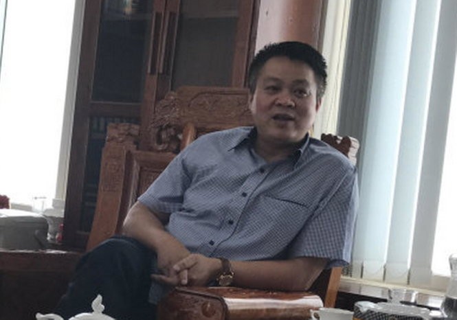Ông Phạm Sỹ Quý, giám đốc Sở Tài nguyên và môi trường tỉnh Yên Bái, trả lời báo chí ngày 29-6 - Ảnh: Thân Hoàng