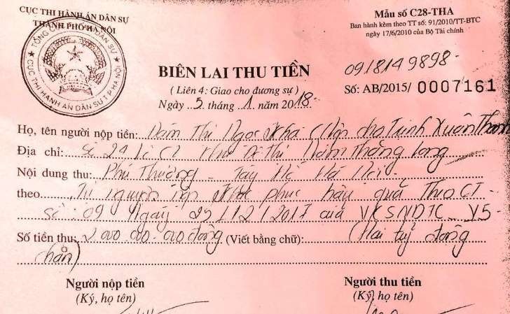 Gia đình ông Trịnh Xuân Thanh nộp tiền khắc phục hậu quả ảnh 1 Gia đình Trịnh Xuân Thanh đã nộp tiền tại Cục thi hành án. Ảnh: Tiền Phong