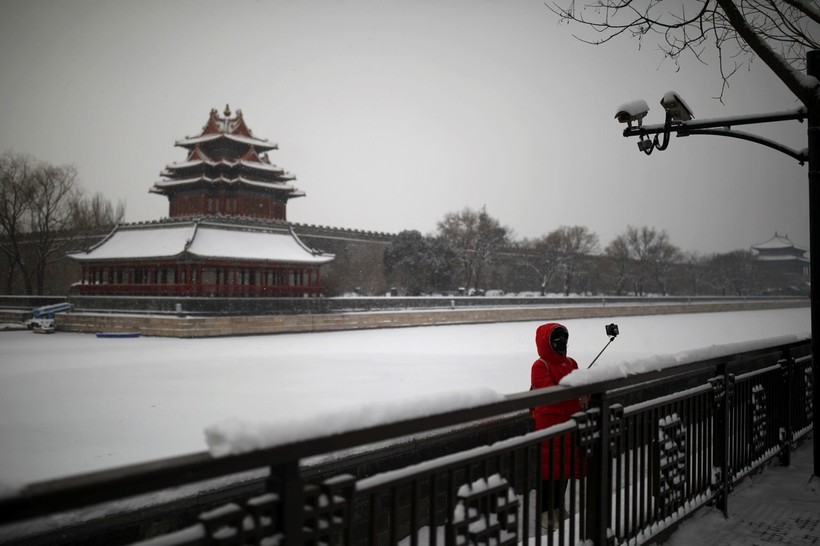 Bắc Kinh hầu như đóng cửa để phòng dịch. Giác Lâu Cố Cung một trong số điểm chụp ảnh đep nhất vắng ngắt du khách (Ảnh: Reuters)