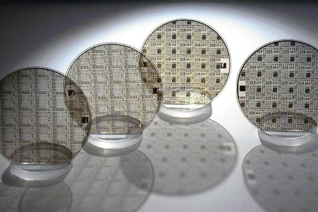 Các tấm wafer sử dụng trong sản xuất chip (Ảnh: AFP)