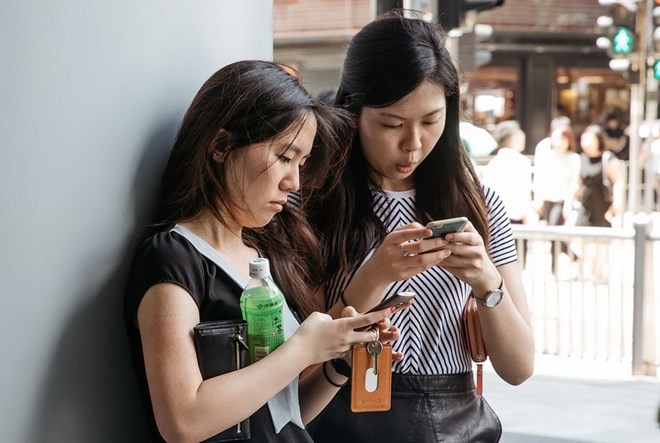 Ở Trung Quốc, các trò chơi trên điện thoại di động đã khiến việc trả tiền cho nội dung trở nên bình thường. (Nguồn: Bloomberg)