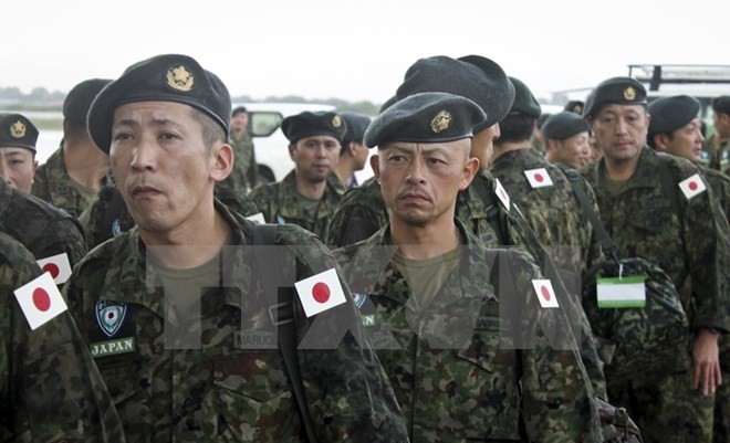 Các thành viên thuộc Các Lực lượng Phòng vệ Nhật Bản. (Nguồn: AP/TTXVN)