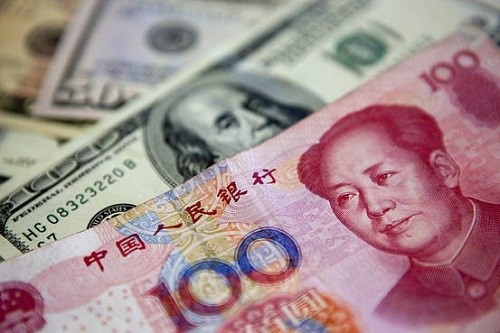 Trung Quốc vừa giảm tỷ giá tham chiếu chính thức hai ngày liên tiếp - Ảnh: Bloomberg